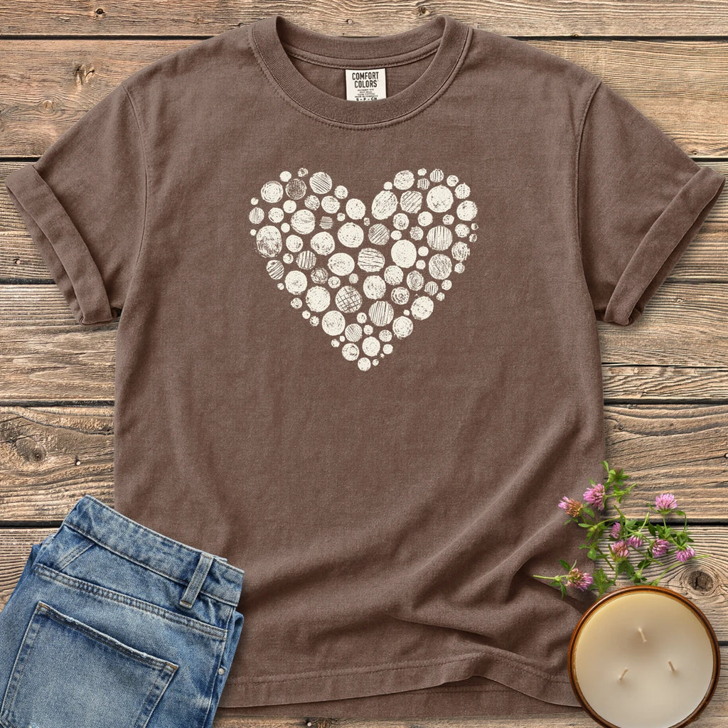 Stipple Heart t-shirt, a heart made of hand-stamped textured circles, on an Espresso Comfort Colors tee