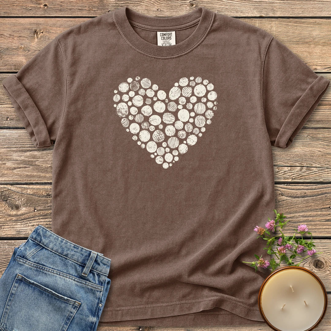 Stipple Heart t-shirt, a heart made of hand-stamped textured circles, on an Espresso Comfort Colors tee
