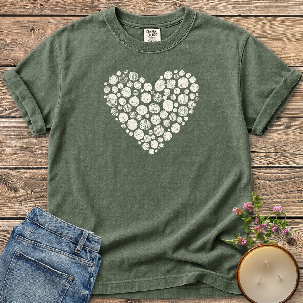 Stipple Heart t-shirt, a heart made of hand-stamped textured circles, on a Moss Comfort Colors tee