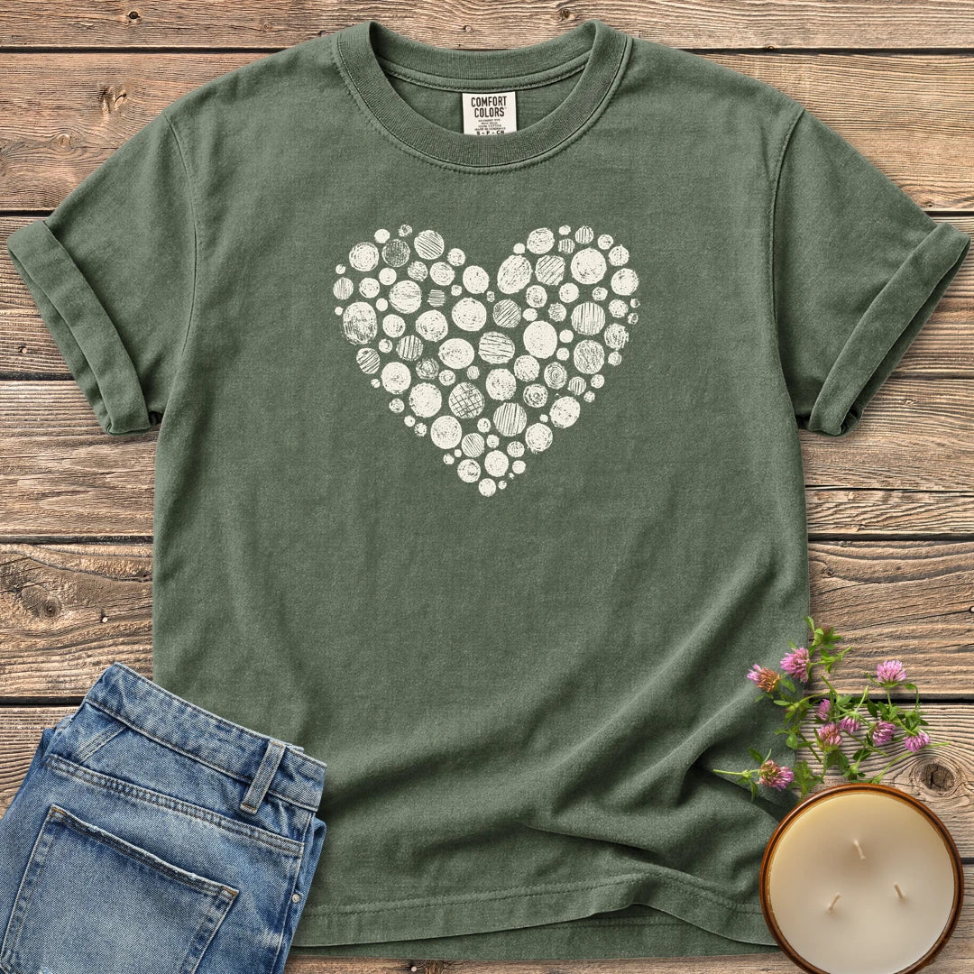 Stipple Heart t-shirt, a heart made of hand-stamped textured circles, on a Moss Comfort Colors tee