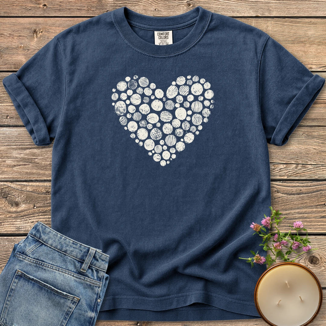 Stipple Heart t-shirt, a heart made of hand-stamped textured circles, on a Navy Comfort Colors tee