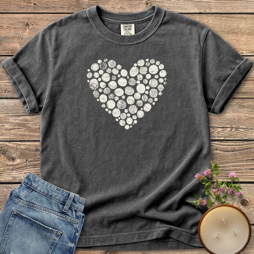 Stipple Heart t-shirt, a heart made of hand-stamped textured circles, on a Pepper Comfort Colors tee