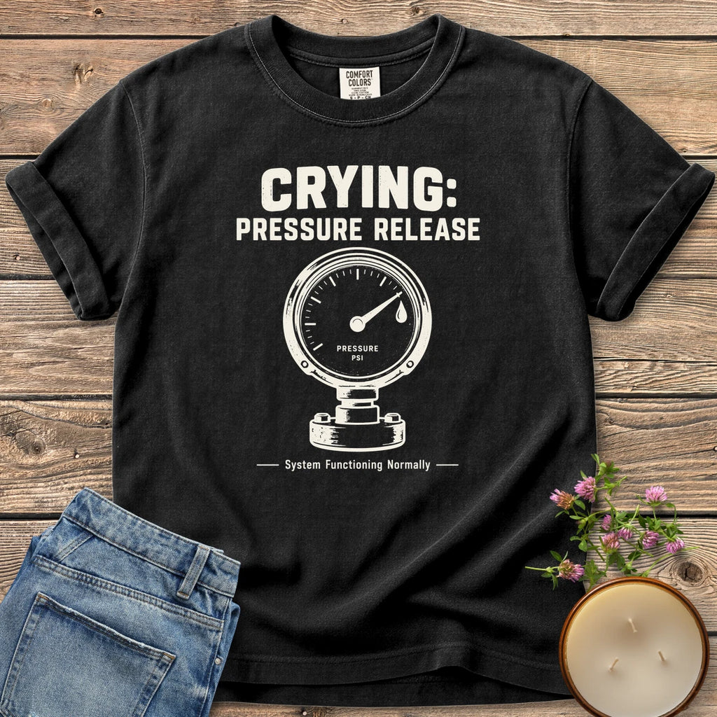 System Functioning Normally t-shirt, Crying: Pressure Release with a vintage pressure gauge and System Functioning Normally, on a Black Comfort Colors tee