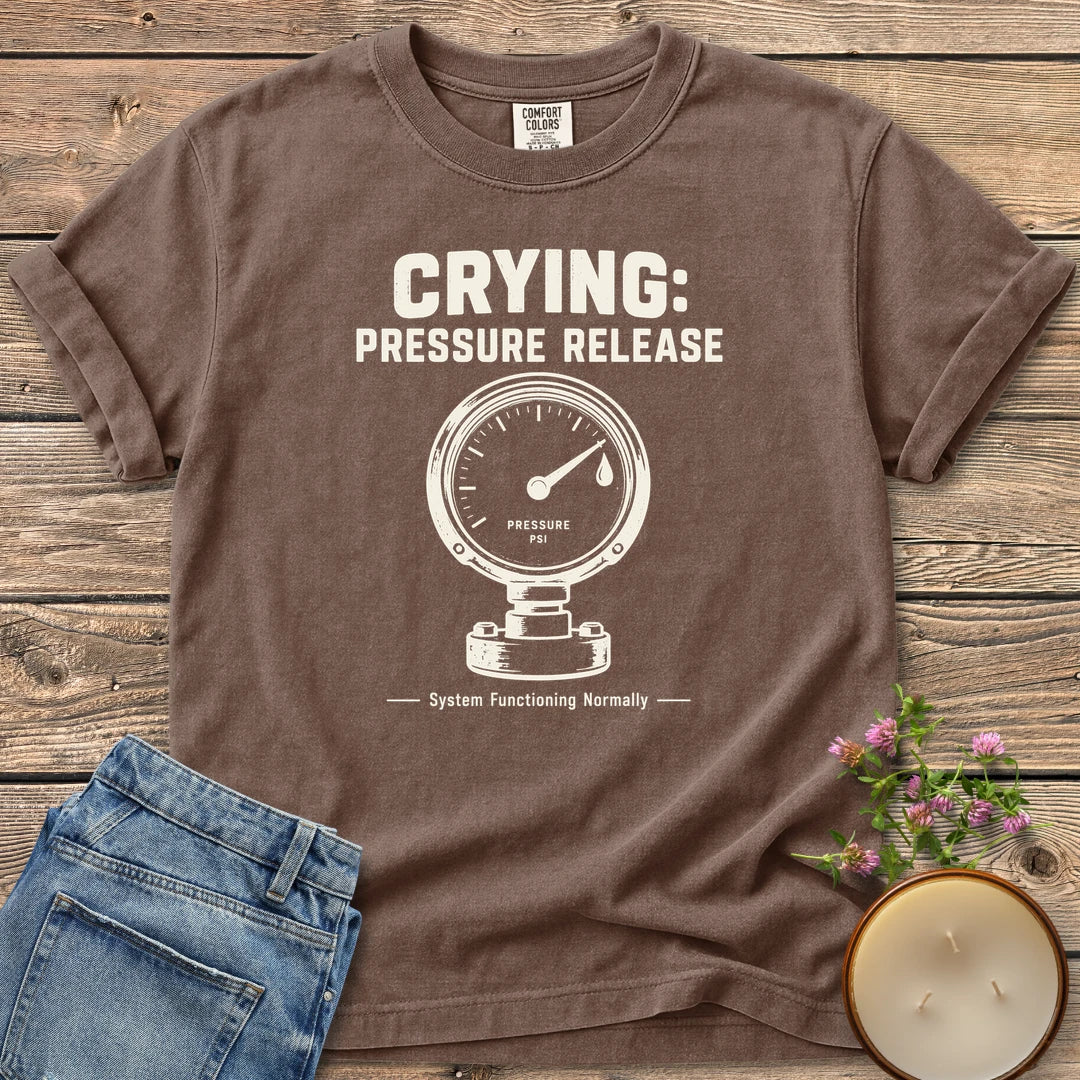 System Functioning Normally t-shirt, Crying: Pressure Release with a vintage pressure gauge and System Functioning Normally, on an Espresso Comfort Colors tee