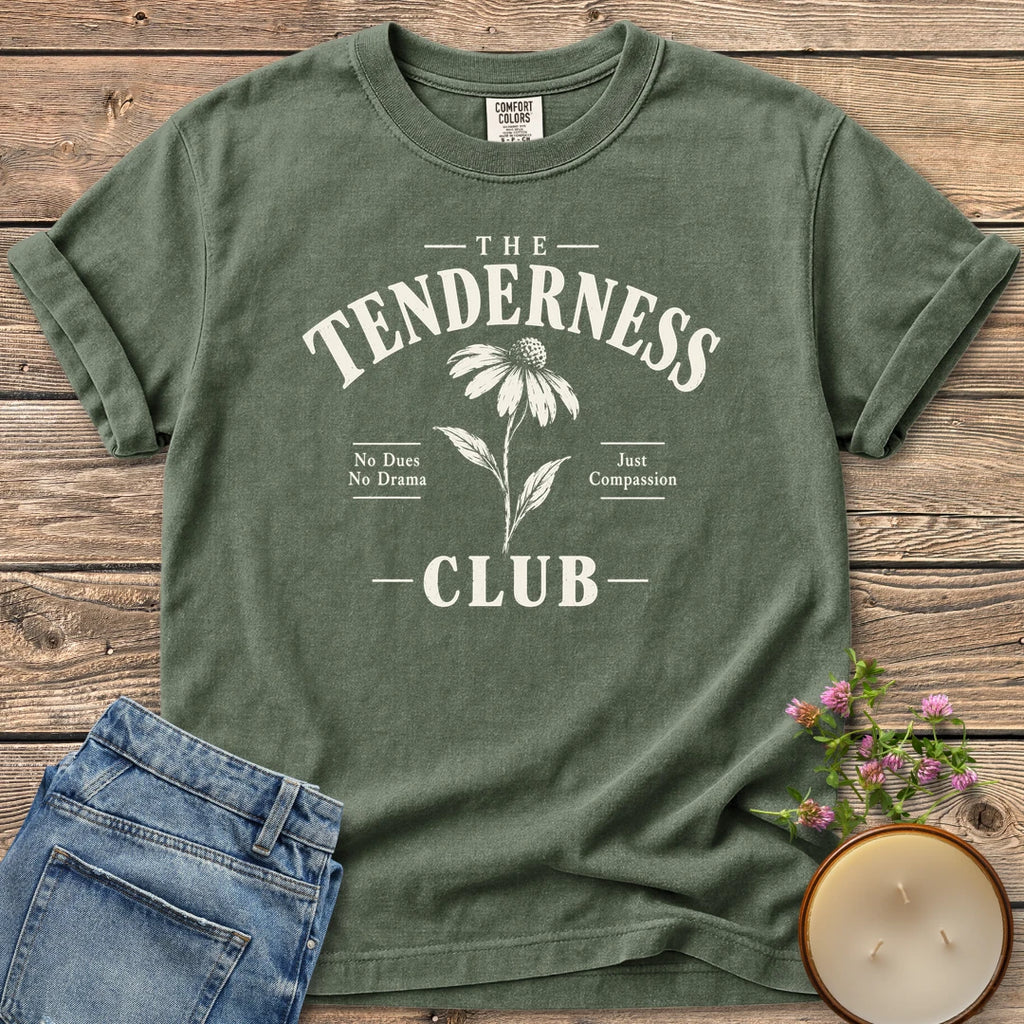 The Tenderness Club t-shirt, The Tenderness Club with a coneflower, No Dues No Drama and Just Compassion, on a Moss Comfort Colors tee