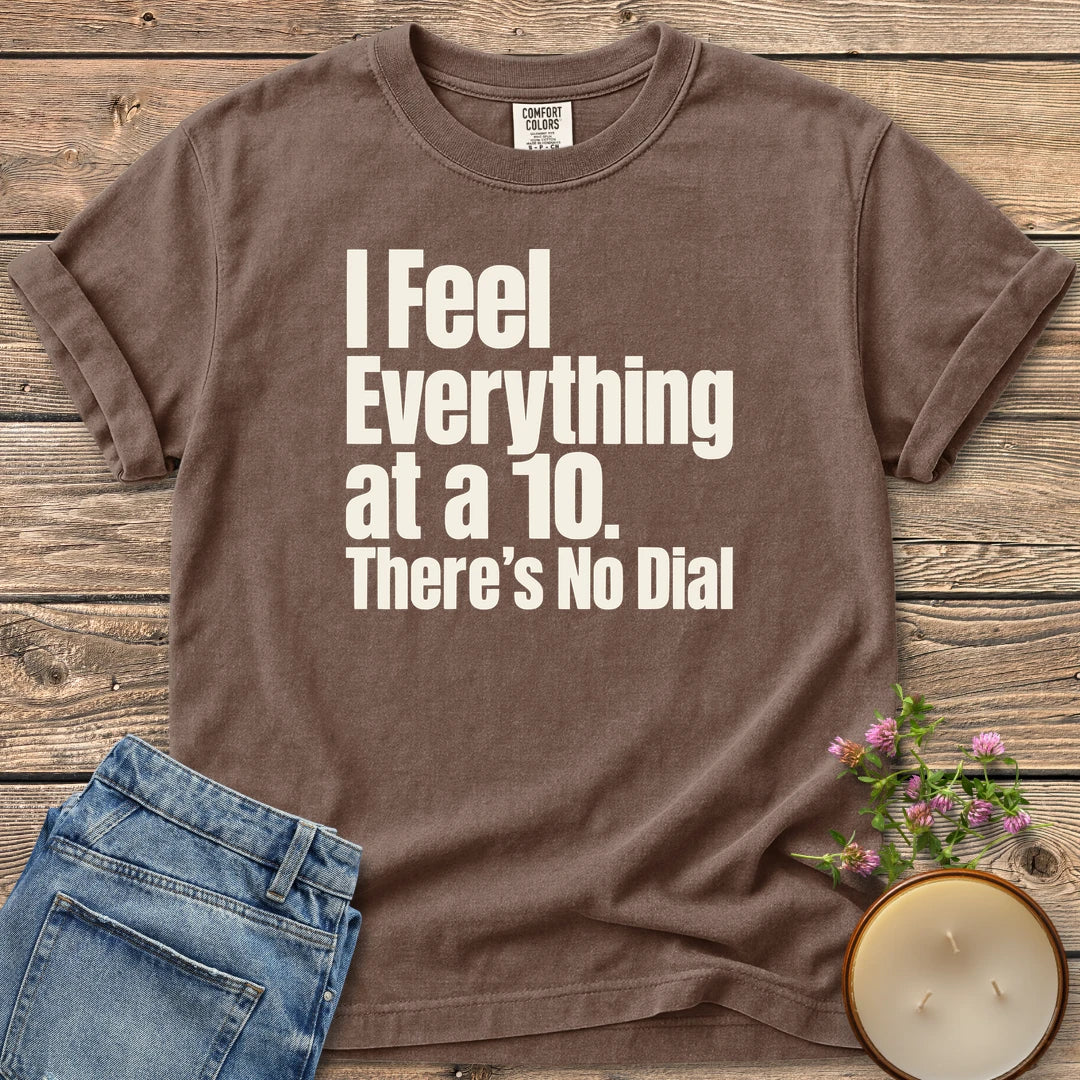 There's No Dial t-shirt, I Feel Everything at a 10. There's No Dial in bold condensed type, on an Espresso Comfort Colors tee