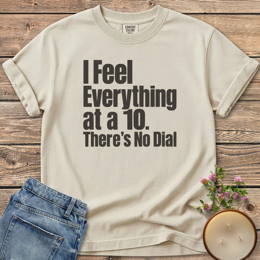 There's No Dial t-shirt, I Feel Everything at a 10. There's No Dial in bold condensed type, on an Ivory Comfort Colors tee
