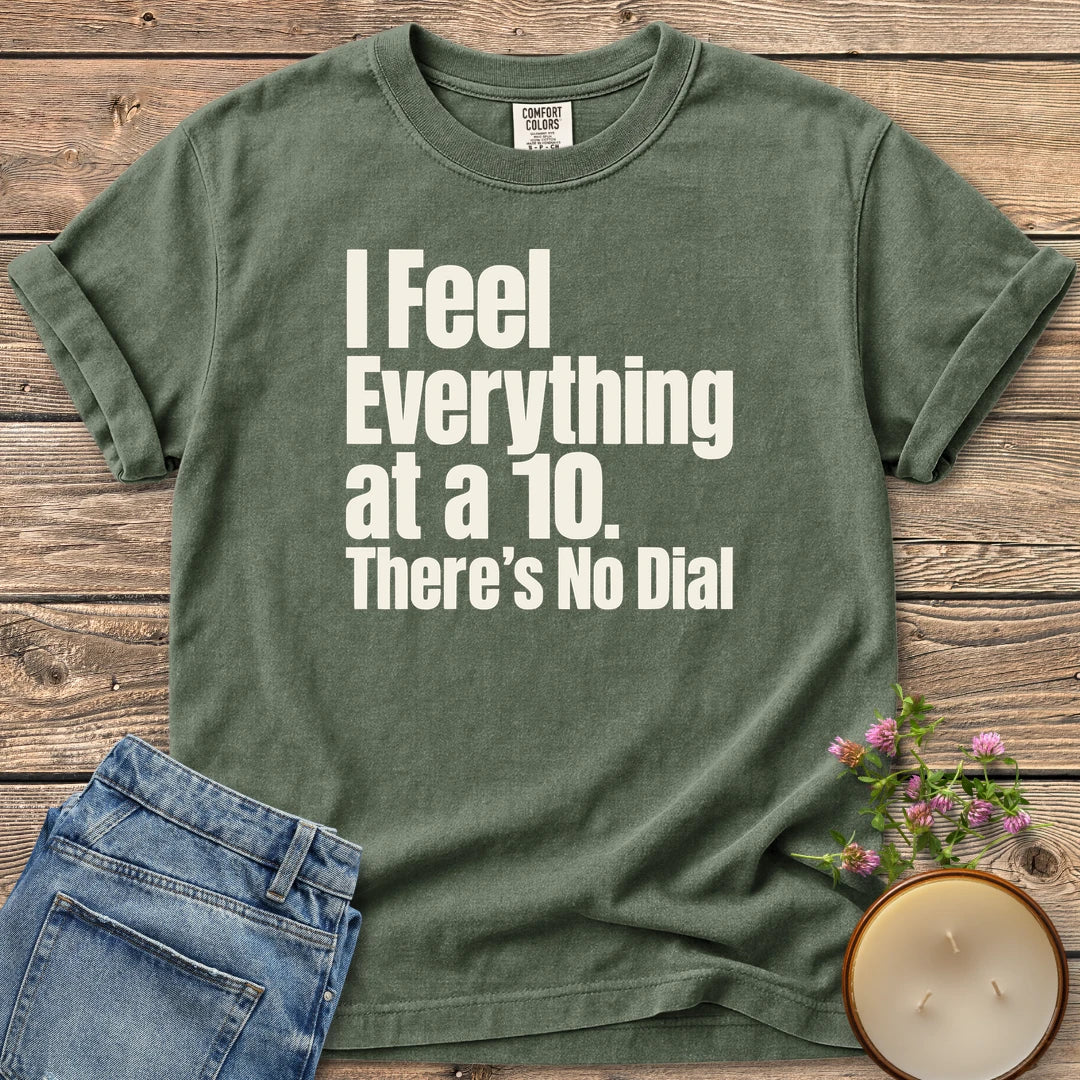 There's No Dial t-shirt, I Feel Everything at a 10. There's No Dial in bold condensed type, on a Moss Comfort Colors tee