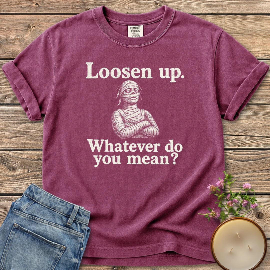 Whatever Do You Mean t-shirt, an annoyed mummy with crossed arms between Loosen up. and Whatever do you mean?, on a Berry Comfort Colors tee